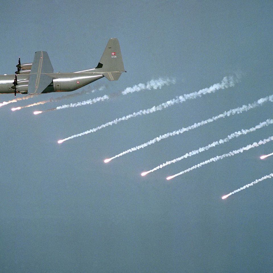 Lockheed Martin C-130J Super Hercules with flares.