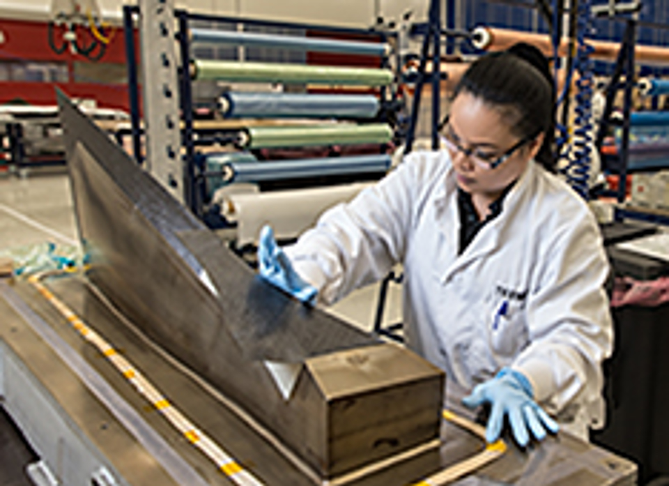 Terma employee working in production.