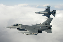 Two F-16 Fighting Falcon aircraft in the air.